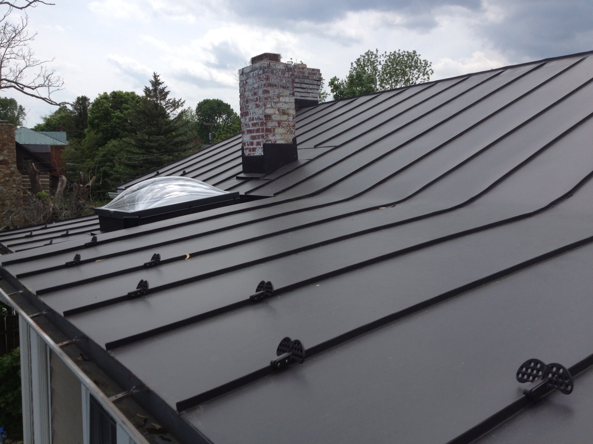 standing-seam-steel-roofing-rain-drain